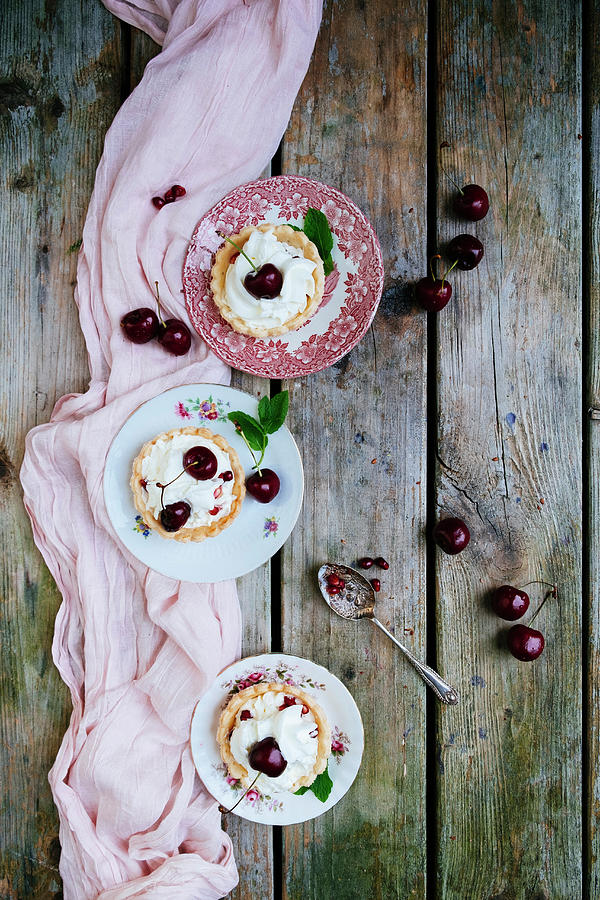 Dessert With Cherries And Whipped Cream Photograph by Lucie Beck