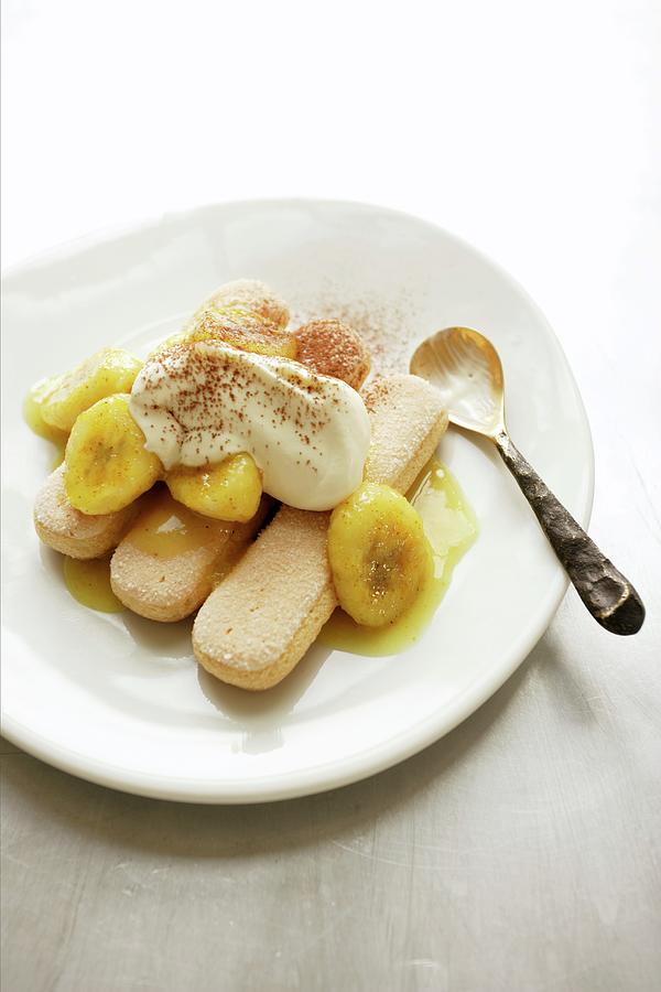 Dessert With Curried Bananas, Sponge Fingers And Cream Photograph by Michael Wissing