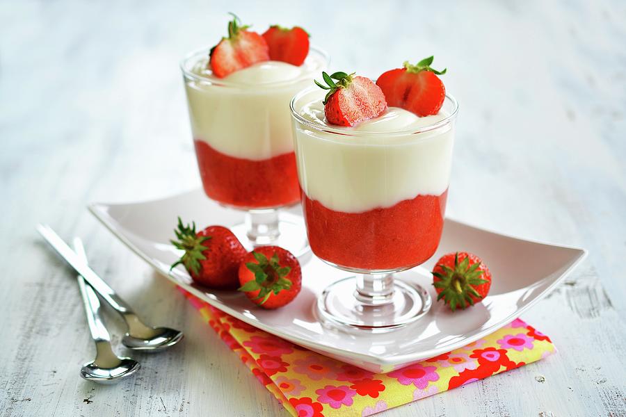 Desserts Made With Strawberry Mousse And Yoghurt In Glasses On A Tray Garnished With Fresh Fruit Photograph by Mariola Streim