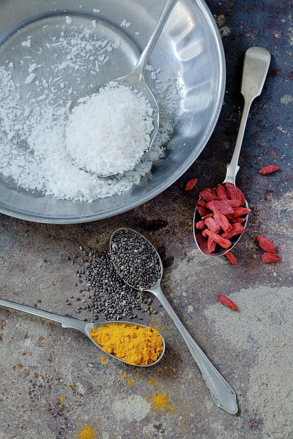 Dessicated Coconut, Chia Seeds, Turmeric And Goji Berries Photograph by Victoria Firmston