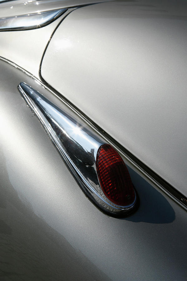 Detail Of A Tail Light On An Photograph by Marc Volk