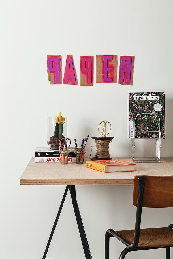 Detail Of Desk With Office Supplies Below Printed Paper Templates On ...