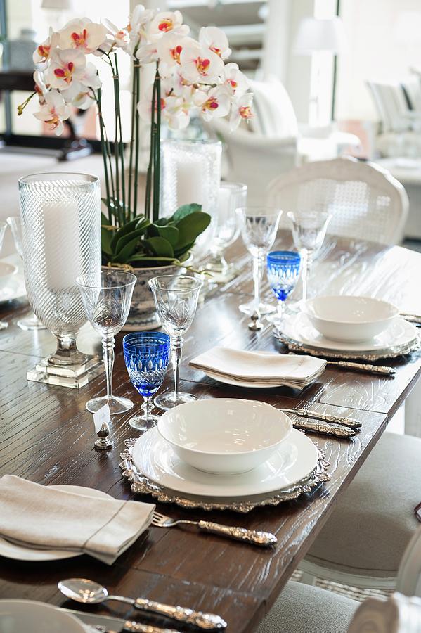 Detail Of Table Set With Crystal Glasses, White Crockery, Silver ...