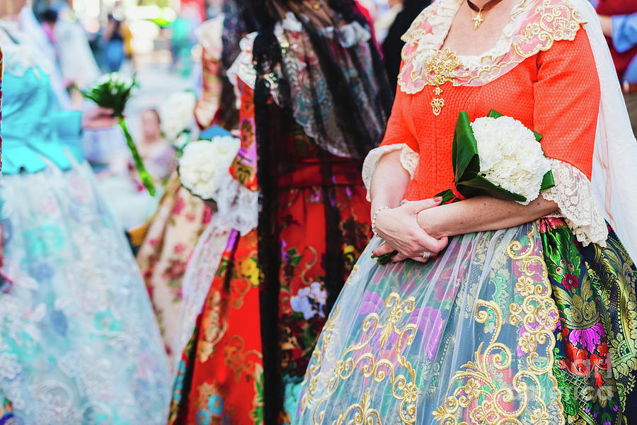 Detail of the traditional Spanish Valencian Fallera dress, colorful fabrics with intricate embroidery. Photograph by Joaquin Corbalan