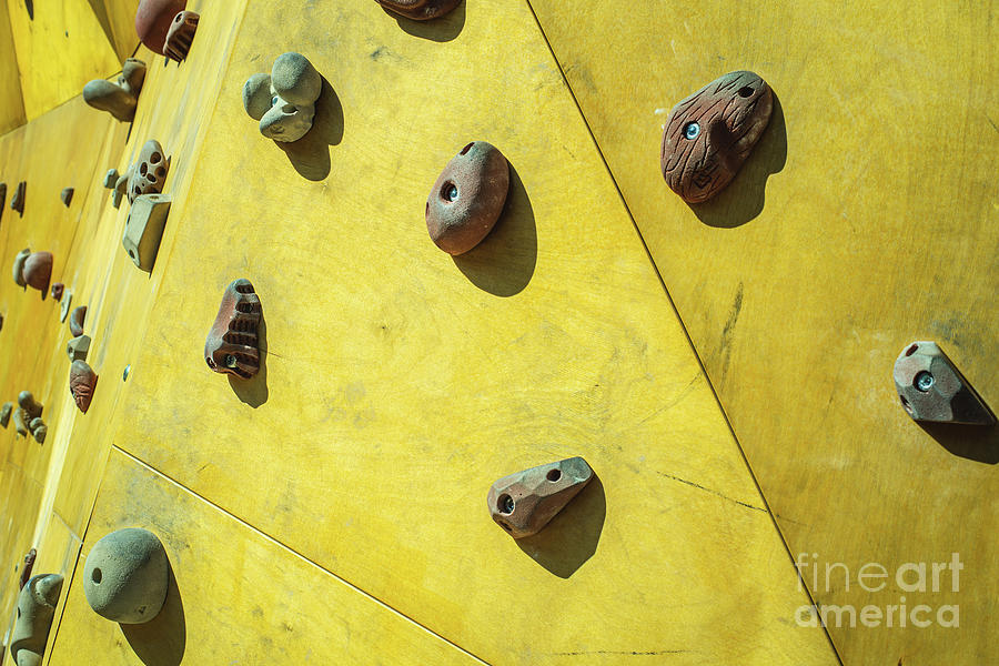 Detail of the wall of an outdoor climbing wall to practice climbing Photograph by Joaquin Corbalan