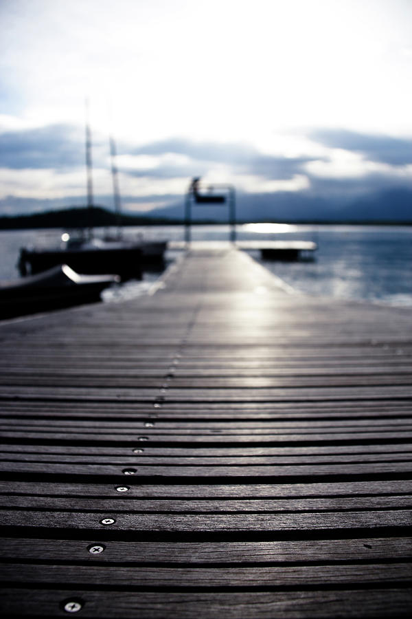 Detail Of Wooden Pier On Lake Photograph by Paolomartinezphotography