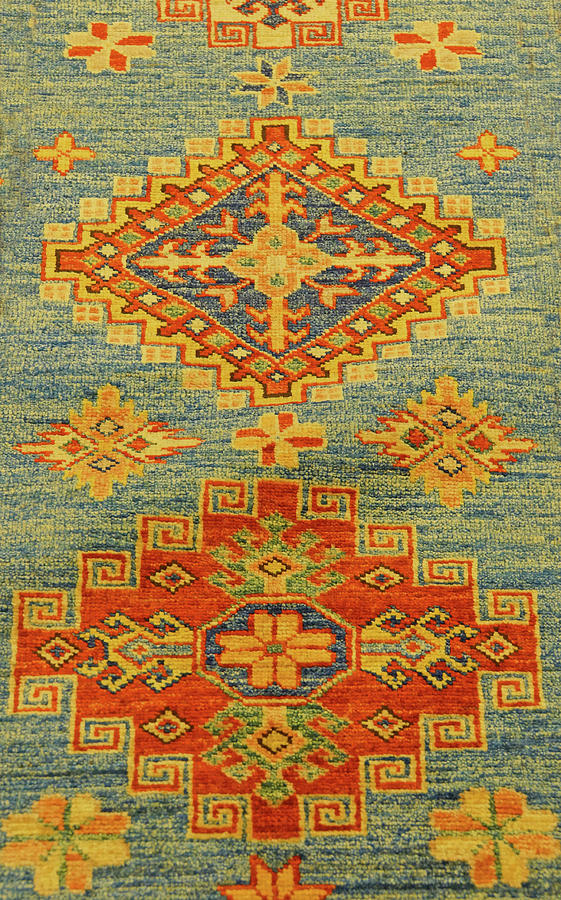 Details of intricate blue patterns in Turkish carpets Photograph by Steve Estvanik