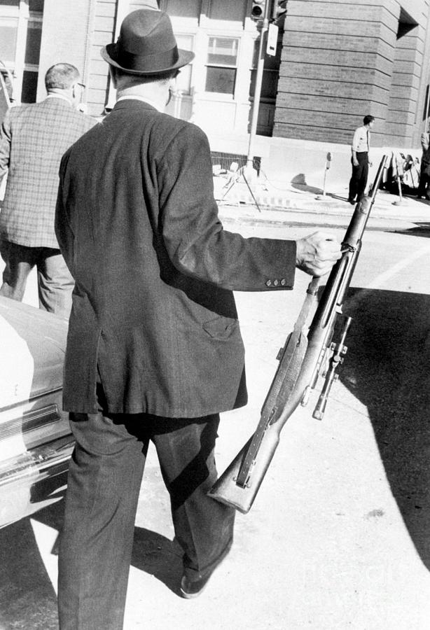 Detective Carries President Kennedy Photograph by Bettmann