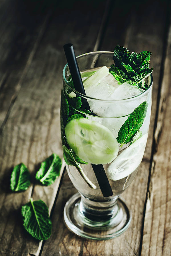 Detox Water With Cucumber, Fresh Mint Leaves And Ice Photograph by Mateusz Siuta