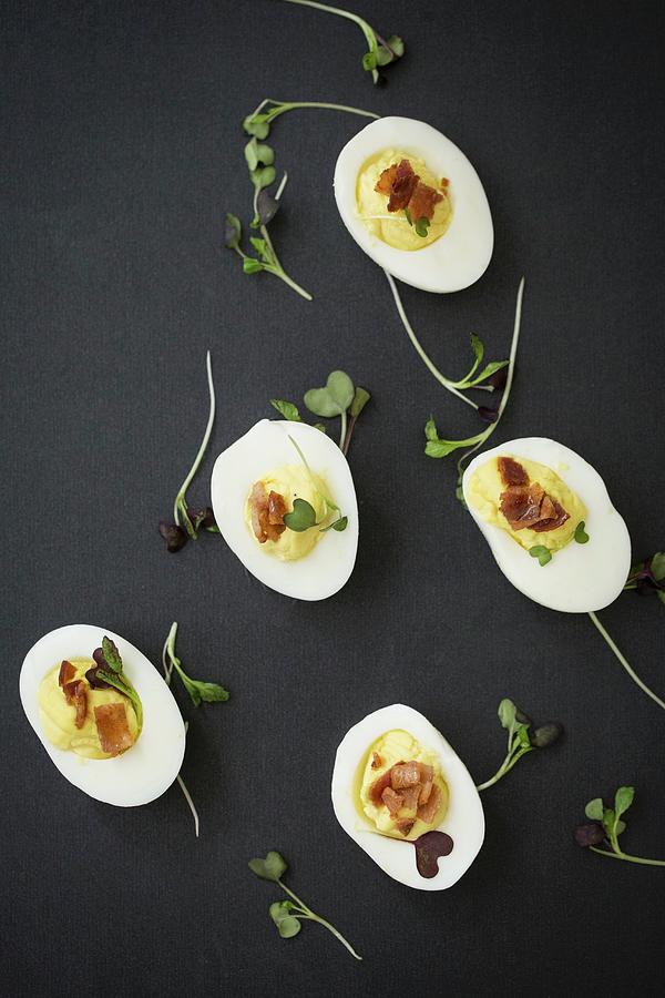 Devilled Eggs With Bacon Photograph by Julia Cawley