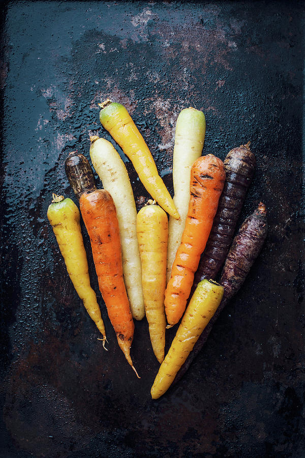 Different Coloured Carrots Photograph by Kate Prihodko