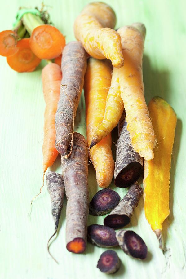 Different Coloured Organic Carrots Photograph by Hilde Mche