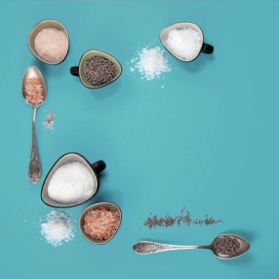 Different Types Of Salt On Blue Background Photograph by Tatjana Baibakova
