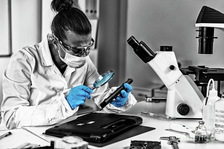 Digital Forensic Investigator At Work Photograph by Microgen Images