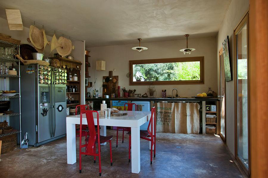 Dining Area And Diy Counter In Eclectic Kitchen Photograph by Christophe Madamour