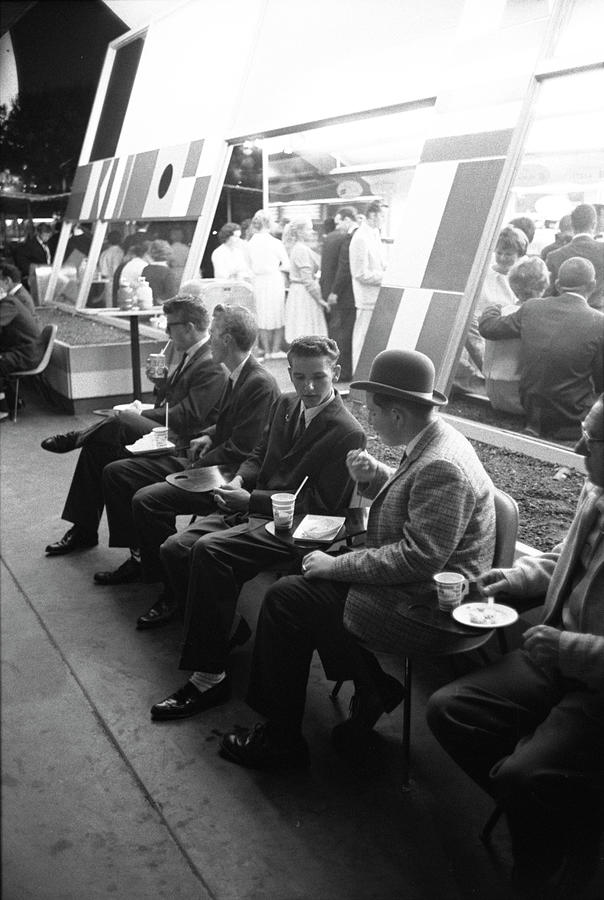 Clothing Photograph - Dining at Tomorrowland by Ralph Crane