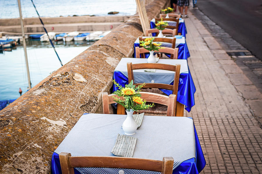 Dinner table in Italian restaurant Photograph by Vivida Photo PC