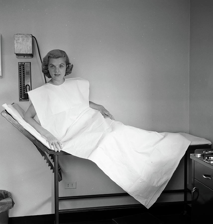 Woman Photograph - Disposable Hospital Gown by Peter Stackpole