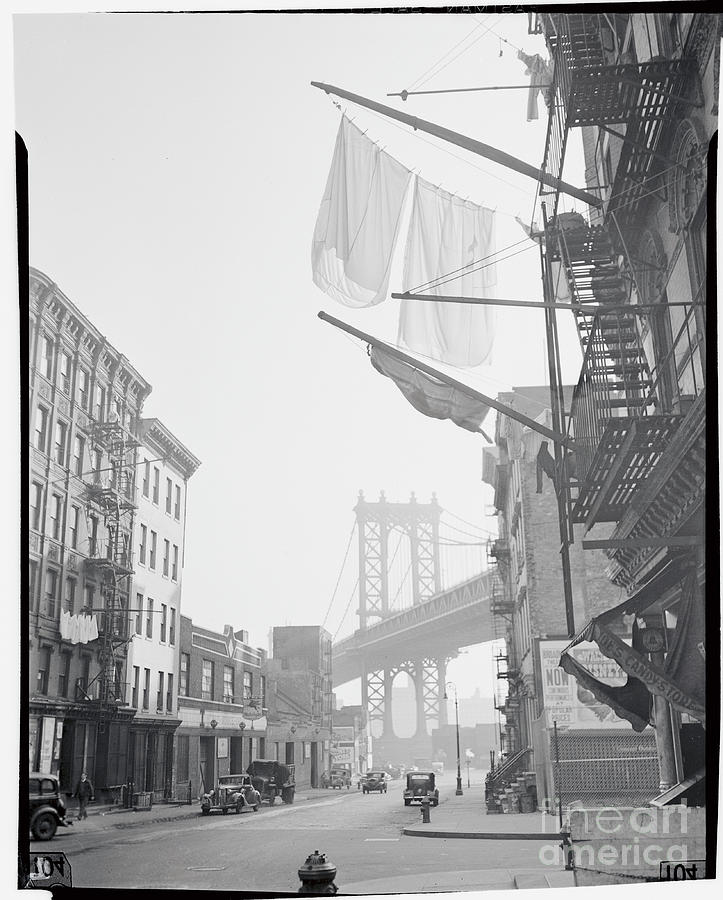 Distant View Of Bridge From Apartments by Bettmann