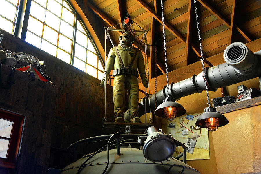 Diving suit at the Hangar Bar Photograph by David Lee Thompson