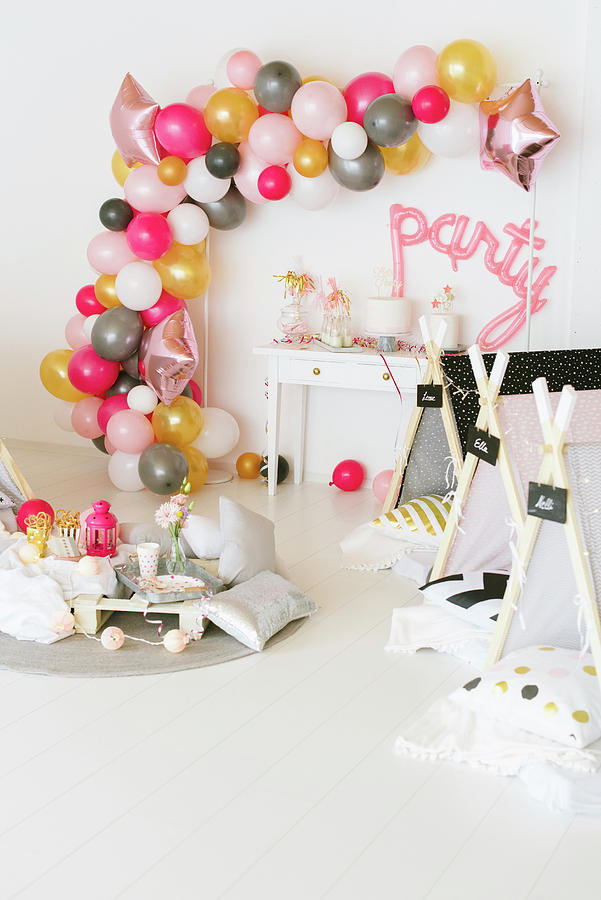 Diy Balloon Garland And Wigwams In Party Room Photograph by Katja Heil