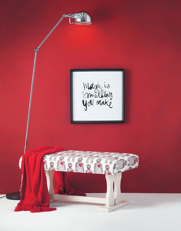 Diy Bench Made From Former Wooden Coffee Table Arranged With Framed Motto On Red Wall And Standard Lamp Photograph by Great Stock!