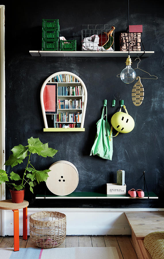 Diy Coat Rack Made From Shelves On Black Wall Photograph by Nicoline Olsen