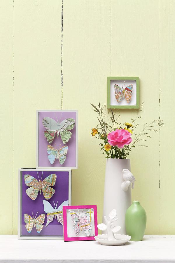Diy Display Boxes With Butterflies Made From Old Maps Photograph by Thordis Rggeberg