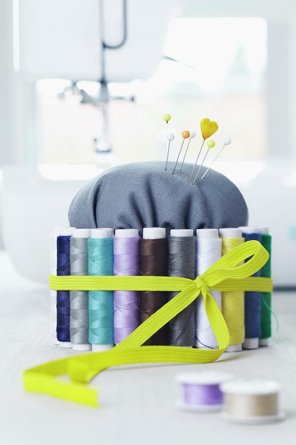 Diy Pin Cushion With Spools Of Thread And Elastic Band Photograph by Franziska Taube
