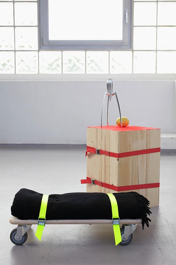 Diy Stool Made From Wooden Slats And Seat Made From Blanket Strapped To Trolley Photograph by Bodo Mertoglu