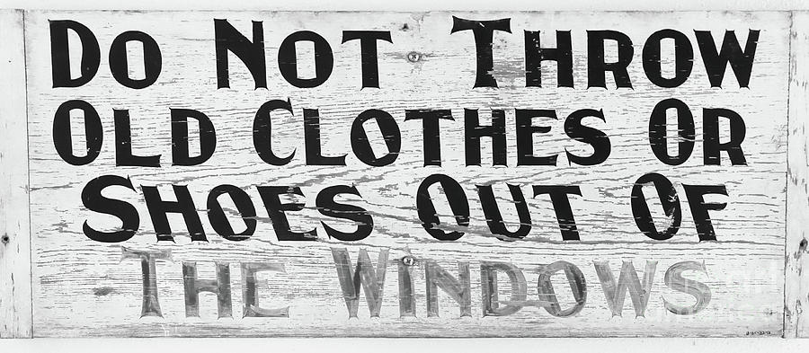 Do Not Throw Old Clothes Or Shoes Out the Window Photograph by Edward Fielding