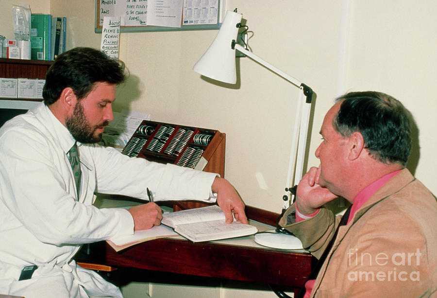Doctor And Patient Consultation Regarding Cataract Photograph by Sue Ford/science Photo Library