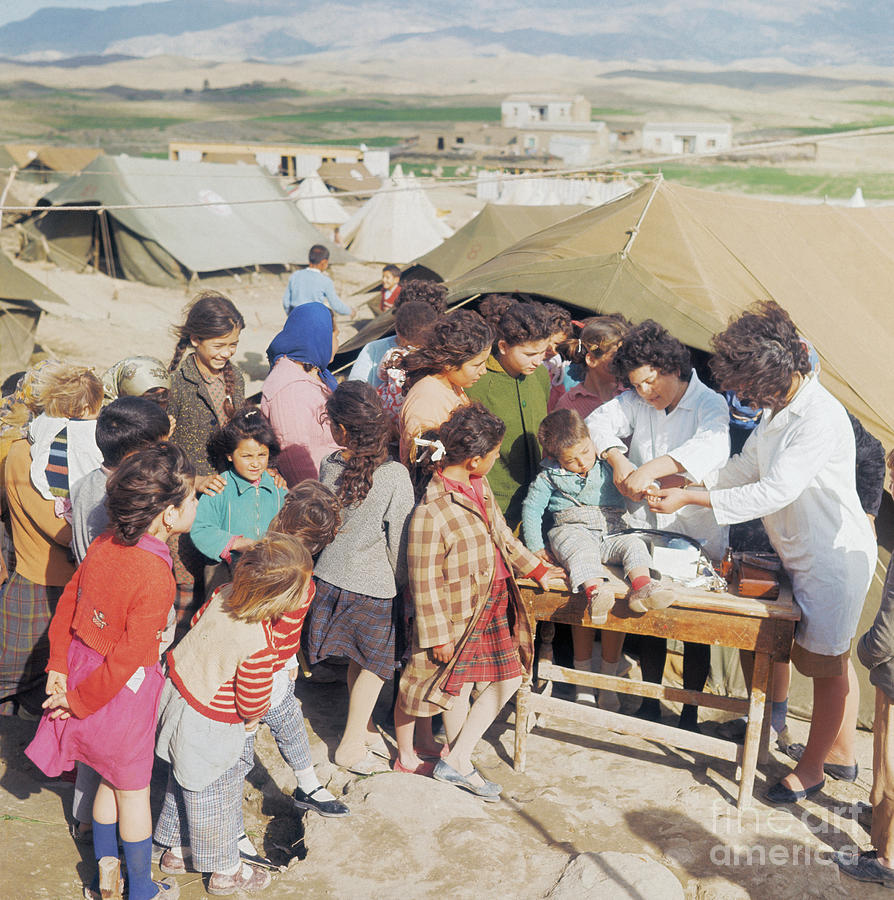 Doctors Treating Child At Turkish Photograph by Bettmann