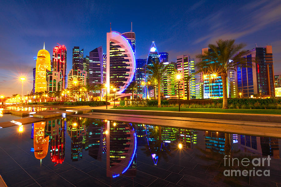 Doha skyline reflection night Photograph by Benny Marty