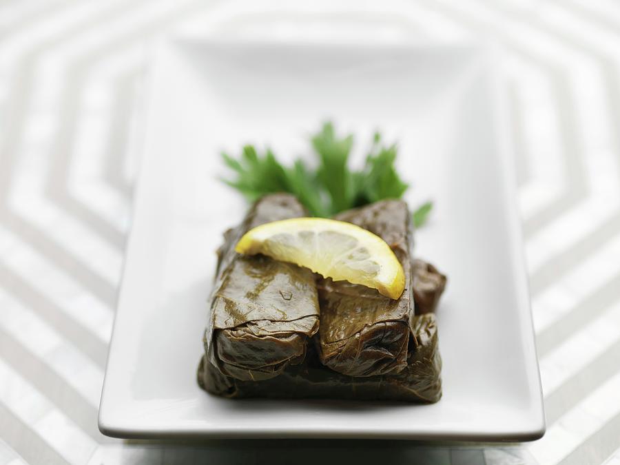 Dolmades With A Slice Of Lemon Photograph by Rob Whitrow
