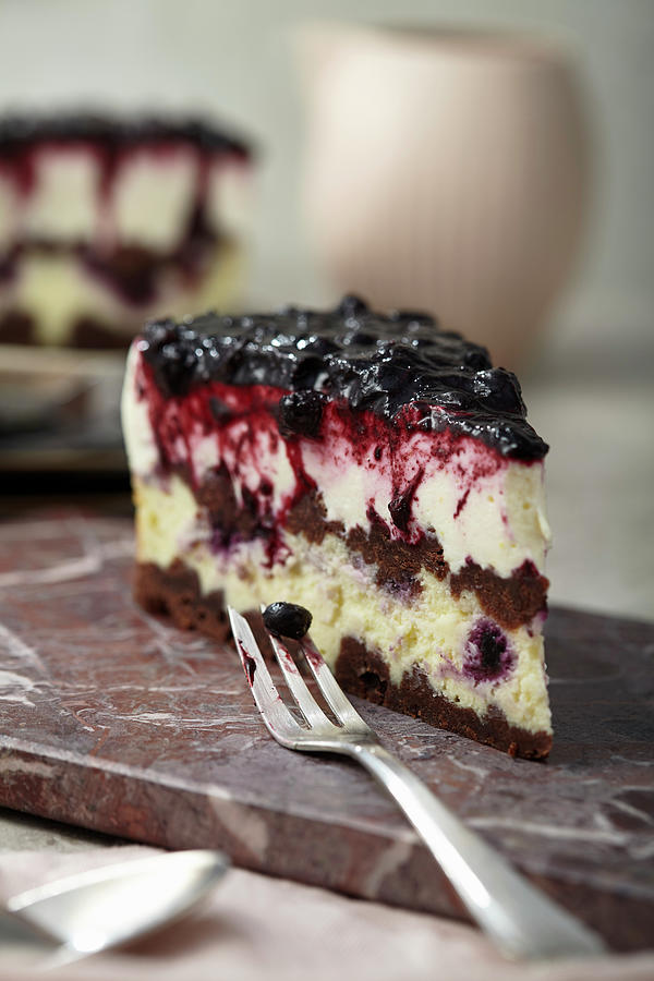 Double Cheesecake With Blueberries Photograph by Ulrike Holsten / Stockfood Studios