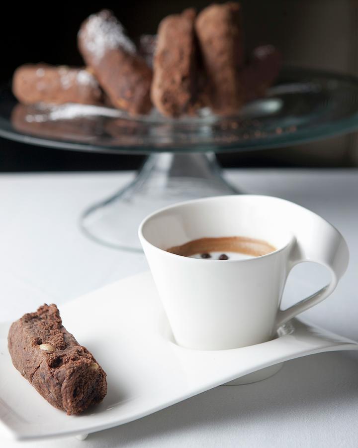 Coffee Photograph - Double Chocolate And Bran Rusks Served With A Caffe Macchiato by Great Stock!