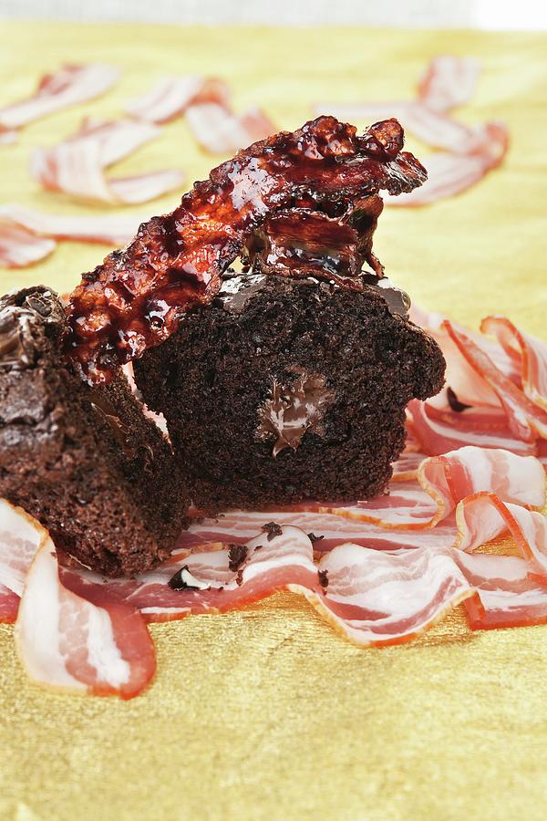 Double Chocolate Cupcake With Hazelnut Butter garnished With Caramelised Bacon Photograph by Atelier Hmmerle