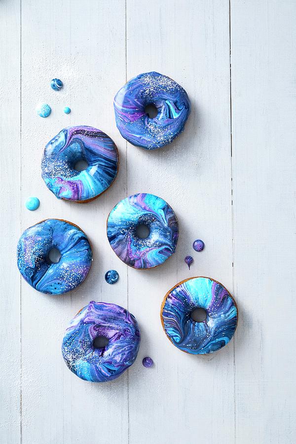 Doughnuts With A Blue And Purple Marbled Glaze Photograph by Great Stock!