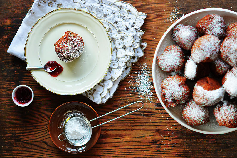 Doughnuts With Icing Sugar On An tagre And A Plate With Spoon Of Jam Photograph by Mariola Streim