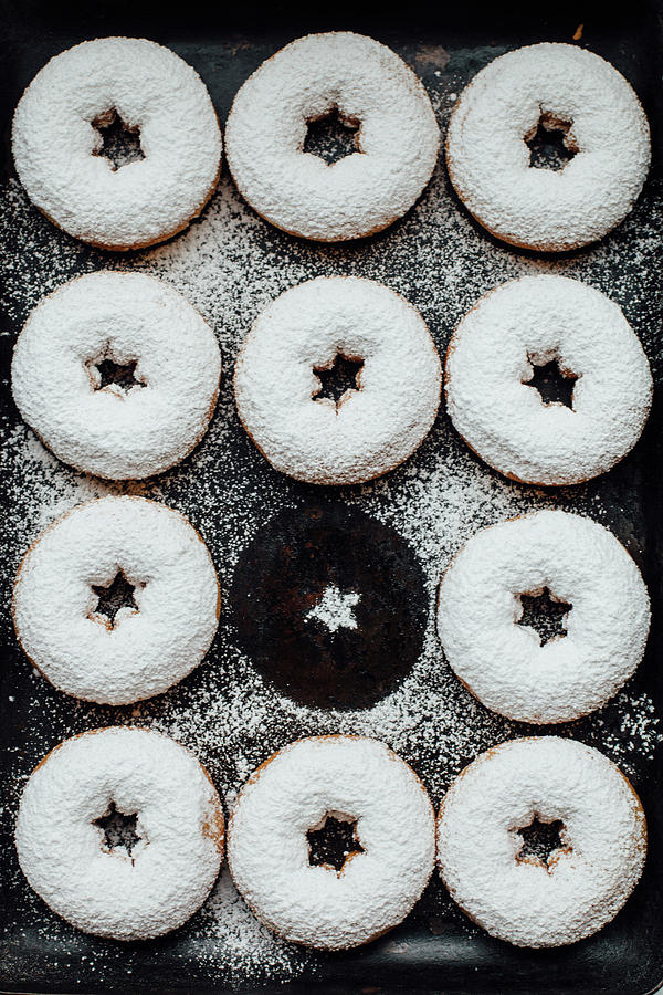 Doughnuts With Powder Sugar Photograph by Kate Prihodko
