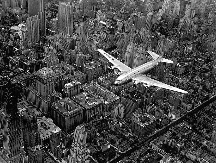 Douglas Four Over Manhattan Photograph by Margaret Bourke-White
