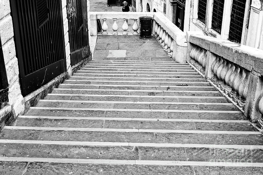 Down the Rialto Bridge Stairs in Venice Photograph by John Rizzuto