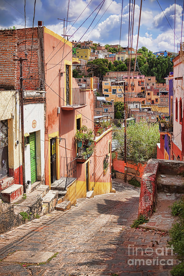 Downhill narrow street in Guanajuato, Mexico Photograph by Tatiana Travelways