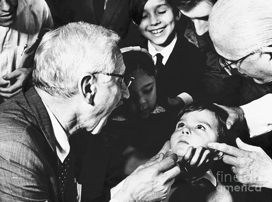 Dr. Albert Sabin Attending To Child Photograph by Bettmann