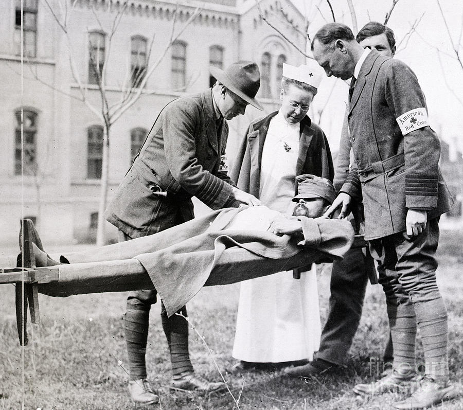 Dr. Kirby Smith Examines Wounded Soldier Photograph by Bettmann