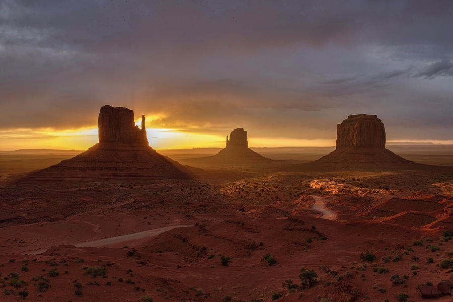 Dramatic Sunrise At Monument Valley Photograph by Dave Stamboulis Travel Photography