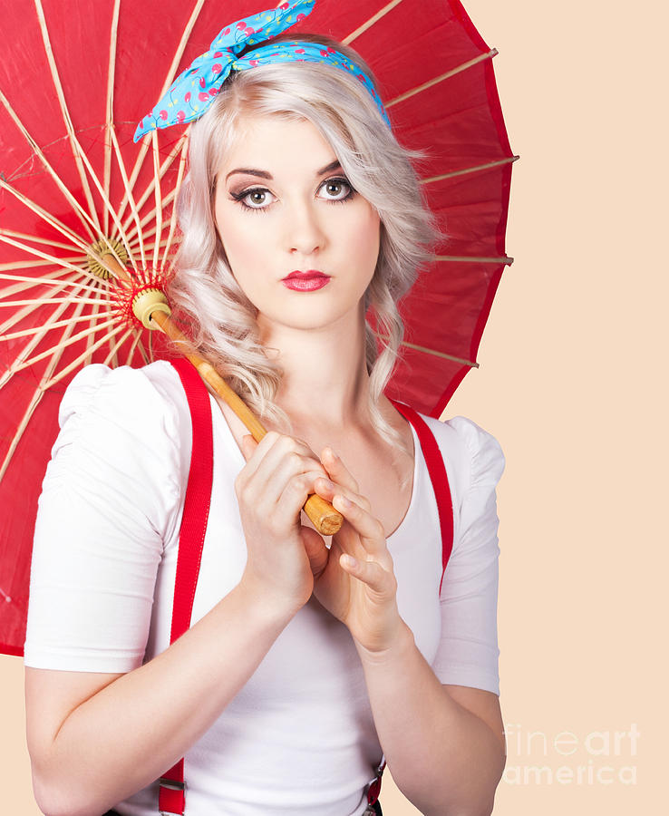 Dreamy blond pin up woman with parasol. Old style Photograph by
