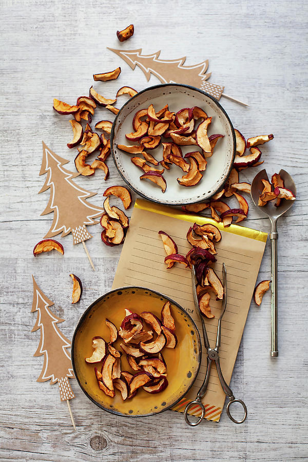 Dried Apple Slices For Christmas Snacking Photograph by Alicja Koll