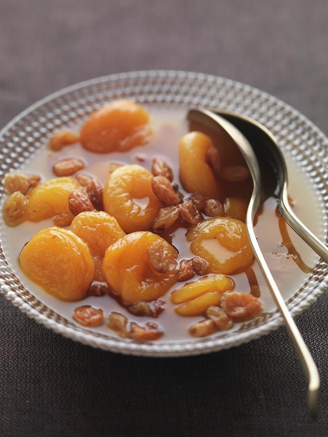 Dried Apricot Compote With Raisins Photograph by Joerg Lehmann